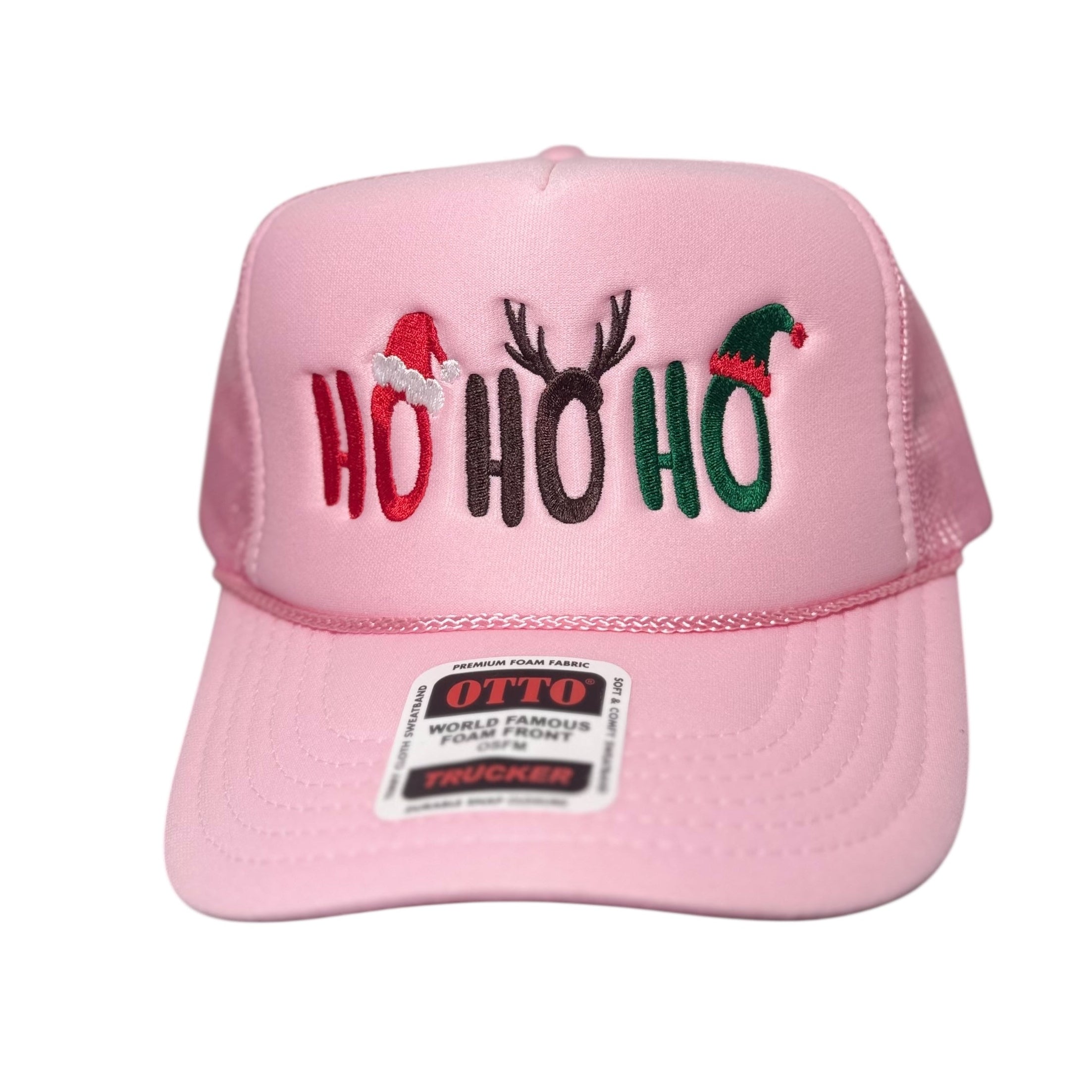 Pink cap with 'HO HO HO' text and Christmas-themed design on a white background