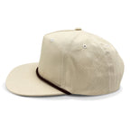 Lost Hat Co. Goat Rope Style Hat - Side Profile Beige cap with brown leather strap on a white background