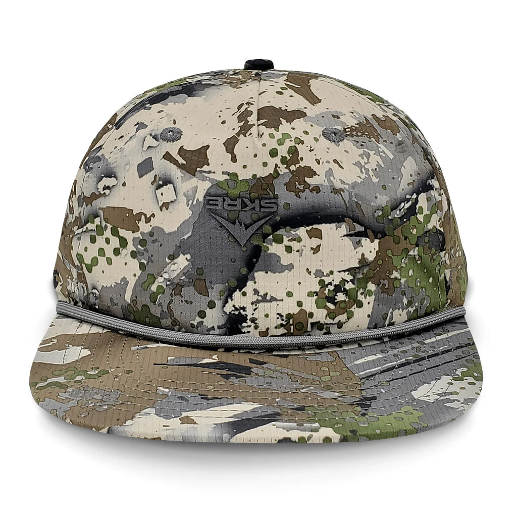 Lost Hat Co. Goat Rope Style Hat - Camouflage baseball cap with SKRE logo on a white background
